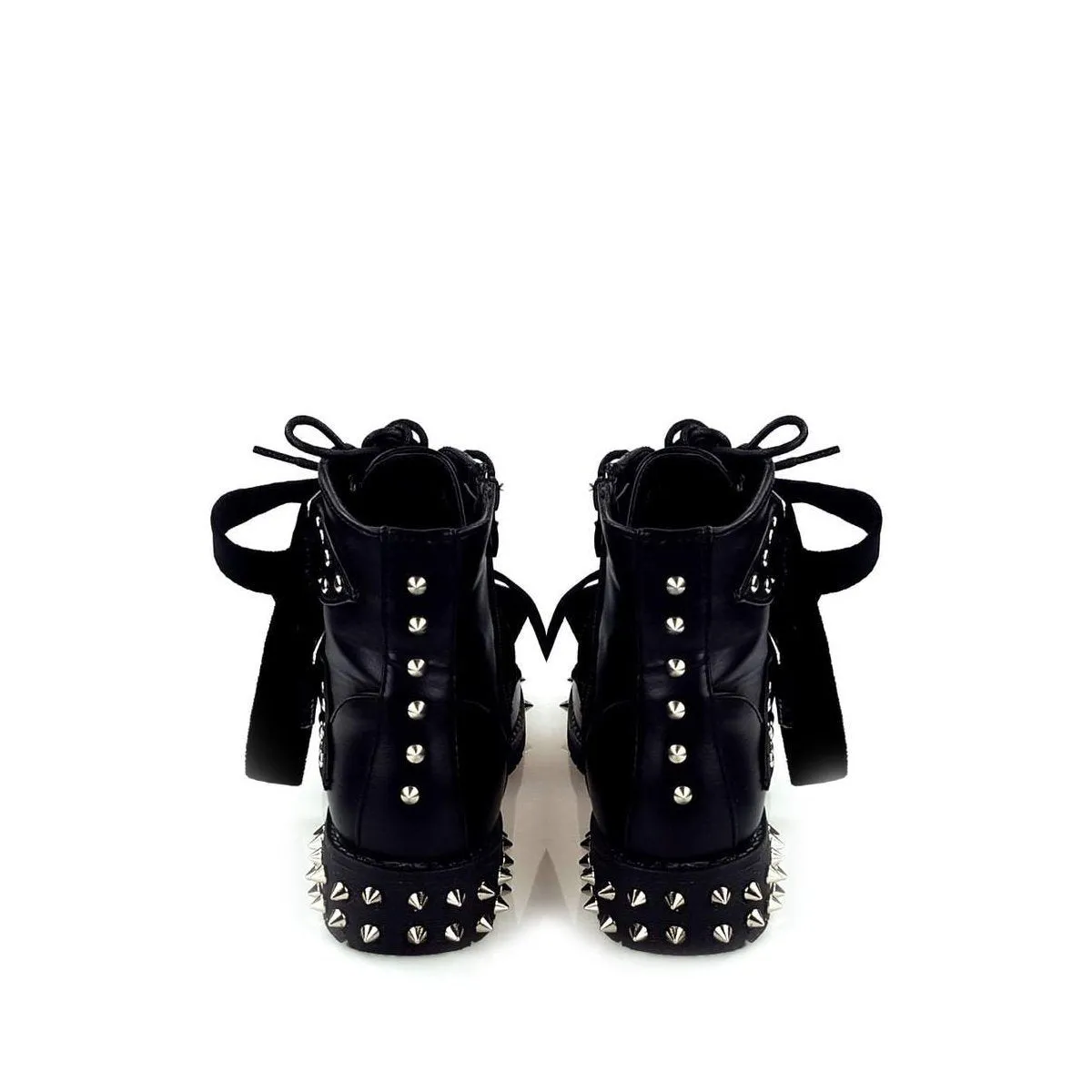 Ria Studded Sole Ankleboot With Bow